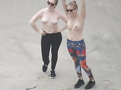 Two hot teenagers get their photos taken, topless!